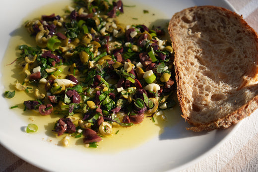 A Mediterranean Medley: Rustic Olive and Herb Dipping Oil