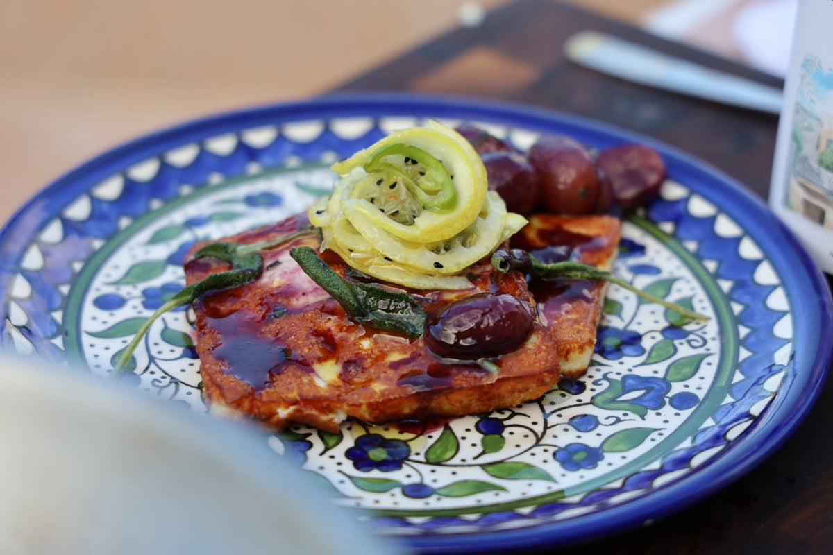 Fried Arabic Cheese in Olive Oil with pickeled Lemon and Caramelized Grapes